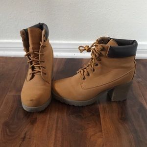 Brown and black tan heel worker boots